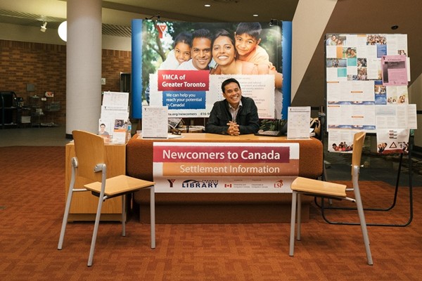 A newcomers welcome info desk at a Toronto public library